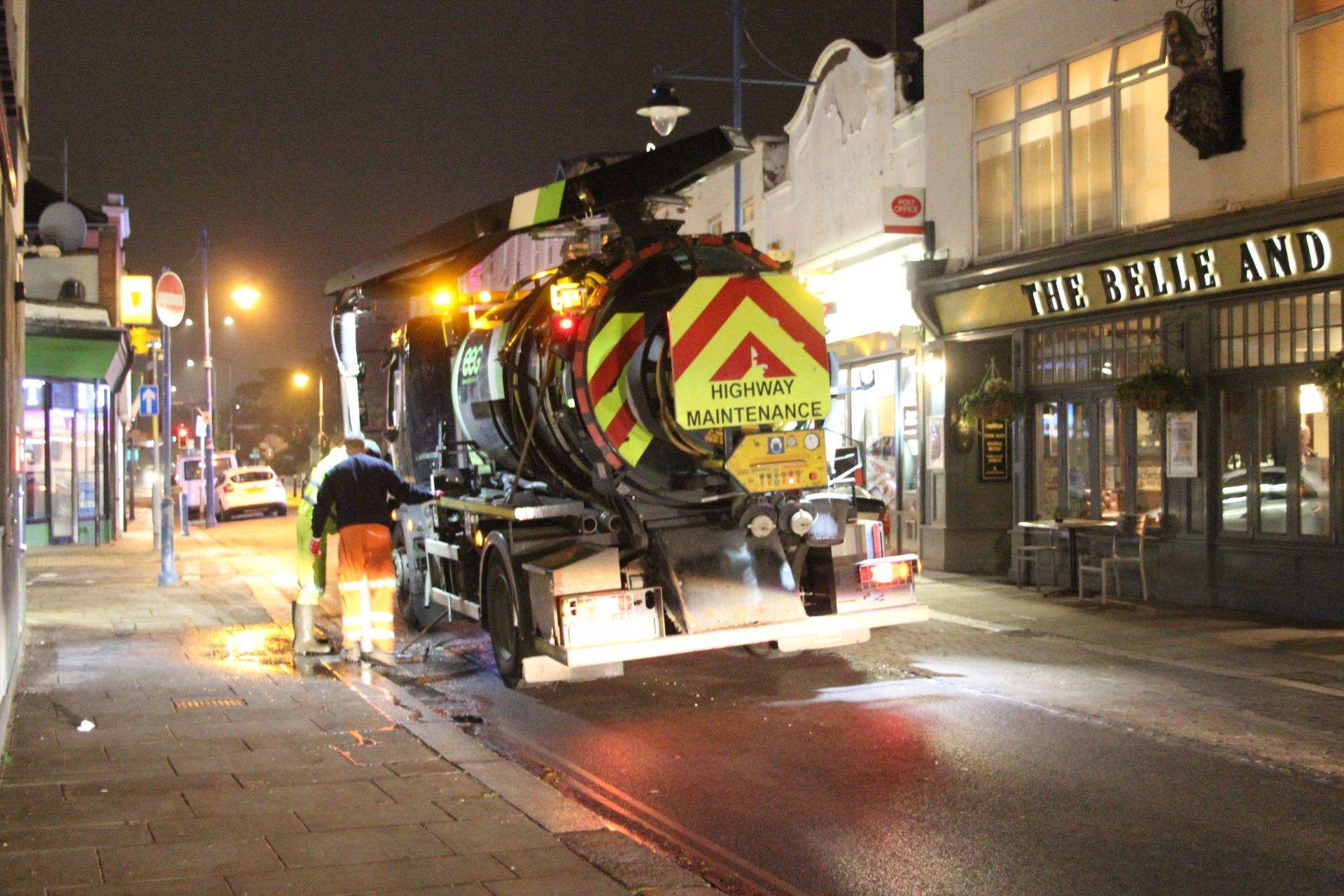 Cleaning drains in Sheerness High Street on Monday night