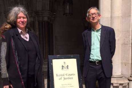 Campaigners Emily Shirley and Michael Rundell outside the High Court