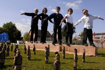 Rebecca Hanagan, Deanna Gibbins, Nicholas Hollands, Harriet Allan and Joshua Bellfield encounter the Terracotta Army during the Beijing games at Parkside School, Canterbury on Thursday. Picture:Chris Davey