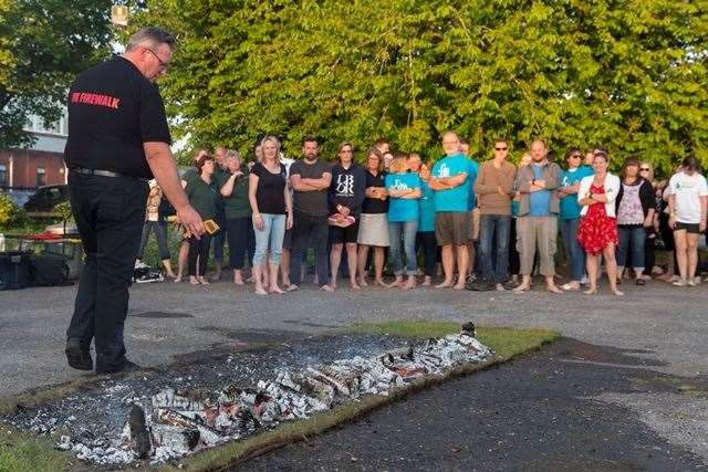 Participants queue up to take part in the 2018 Buster’s Charity Firewalk (15012355)