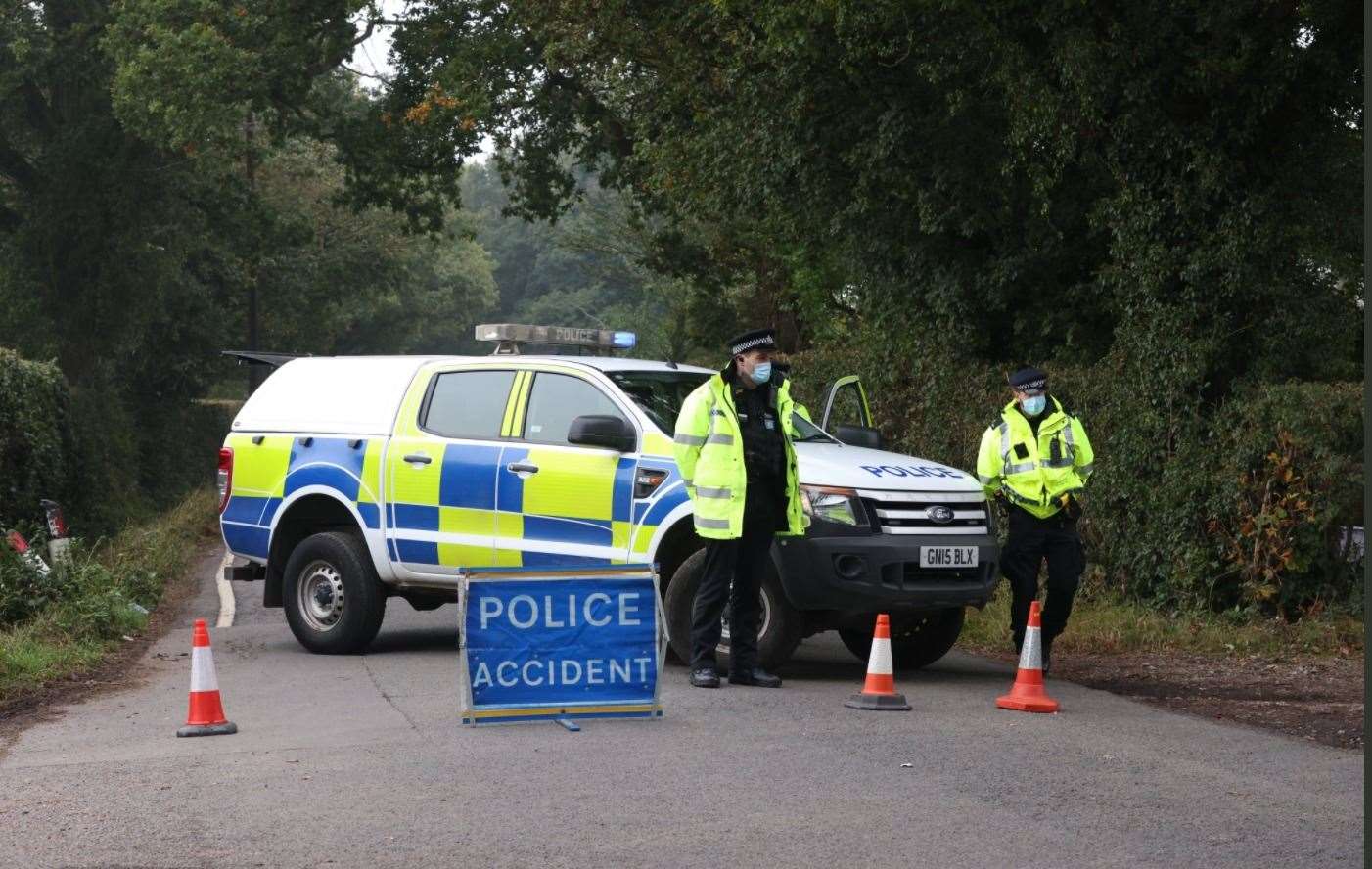 Police attend the scene of a crash in Lenham Road, Headcorn