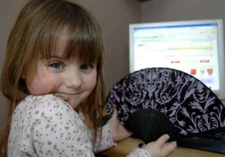 COMPUTER WHIZZ: Maisie Chard purchased a French-style fan on eBay when her mum wasn't looking. Picture: MATTHEW WALKER