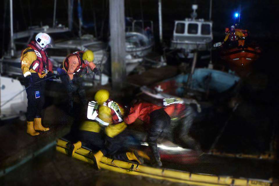 The mud rescue victim is tended to by the emergency services