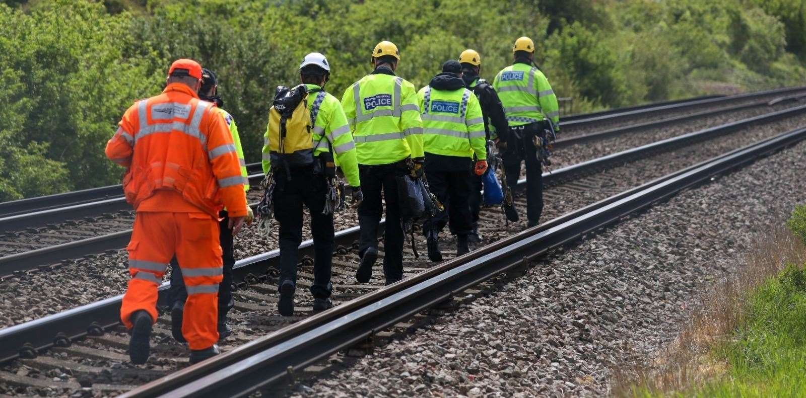 Police teams search railway tracks in Aylesham Picture: UKNIP