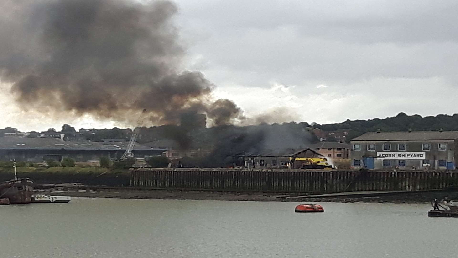 Fire in Rochester, alongside the River Medway