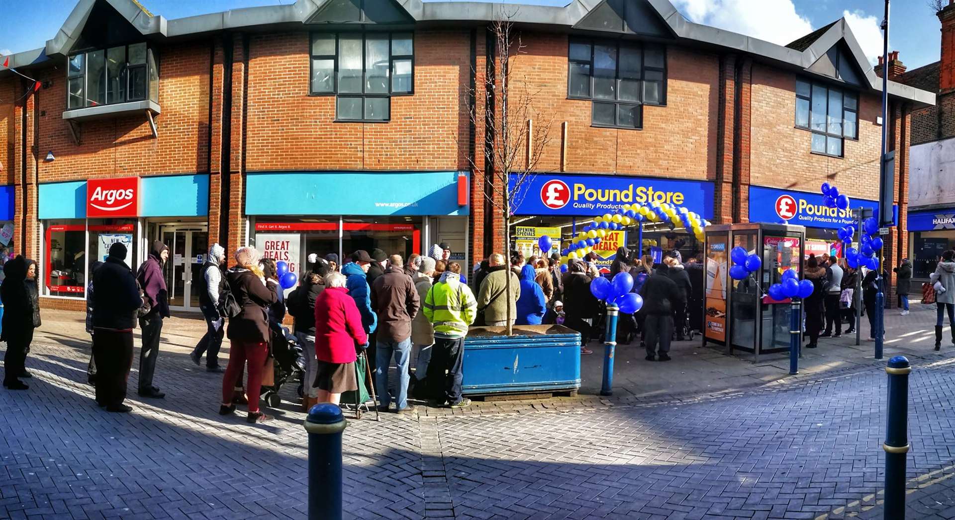 People queued in -2c temperatures to be the first into the new pound store. Picture: Yav Zare