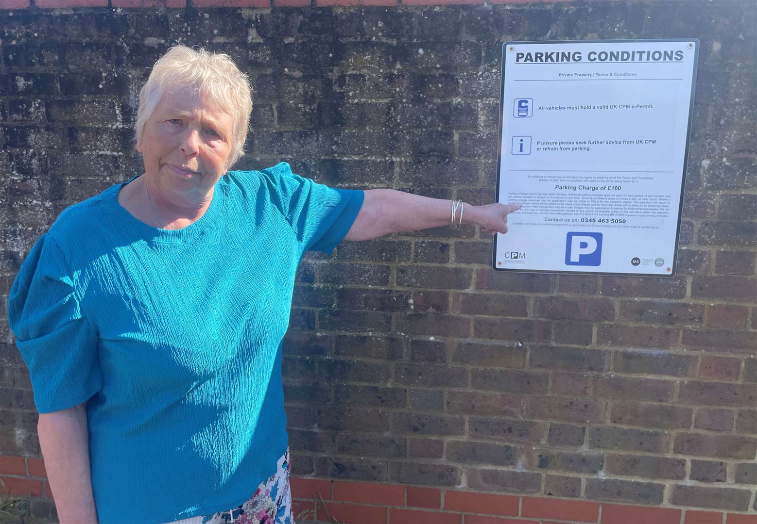 Homeowner Penny Jackson confronted the man putting the signs up and told him to take them down. Picture: Sean McPolin
