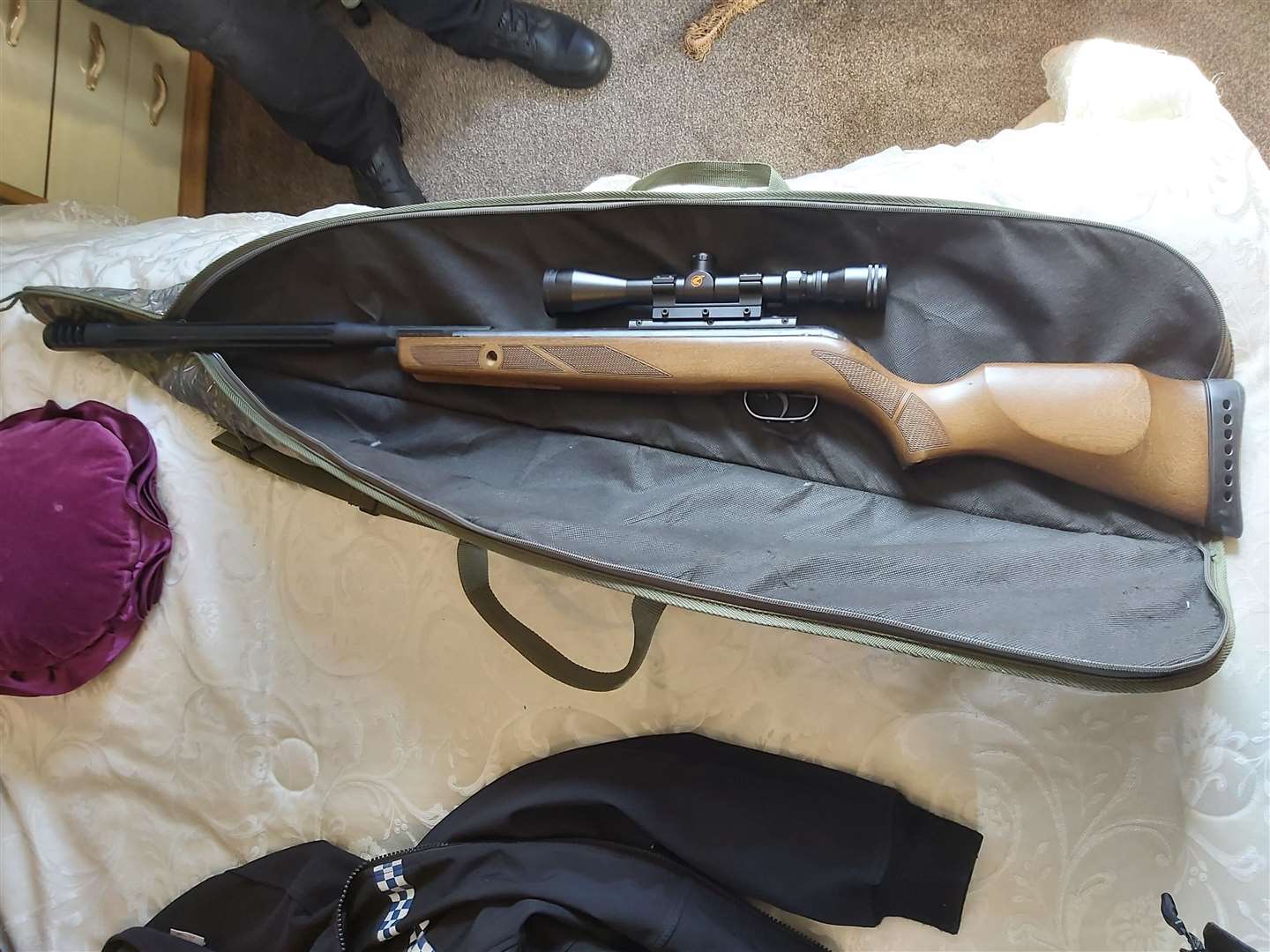 A firearm seized during the raid