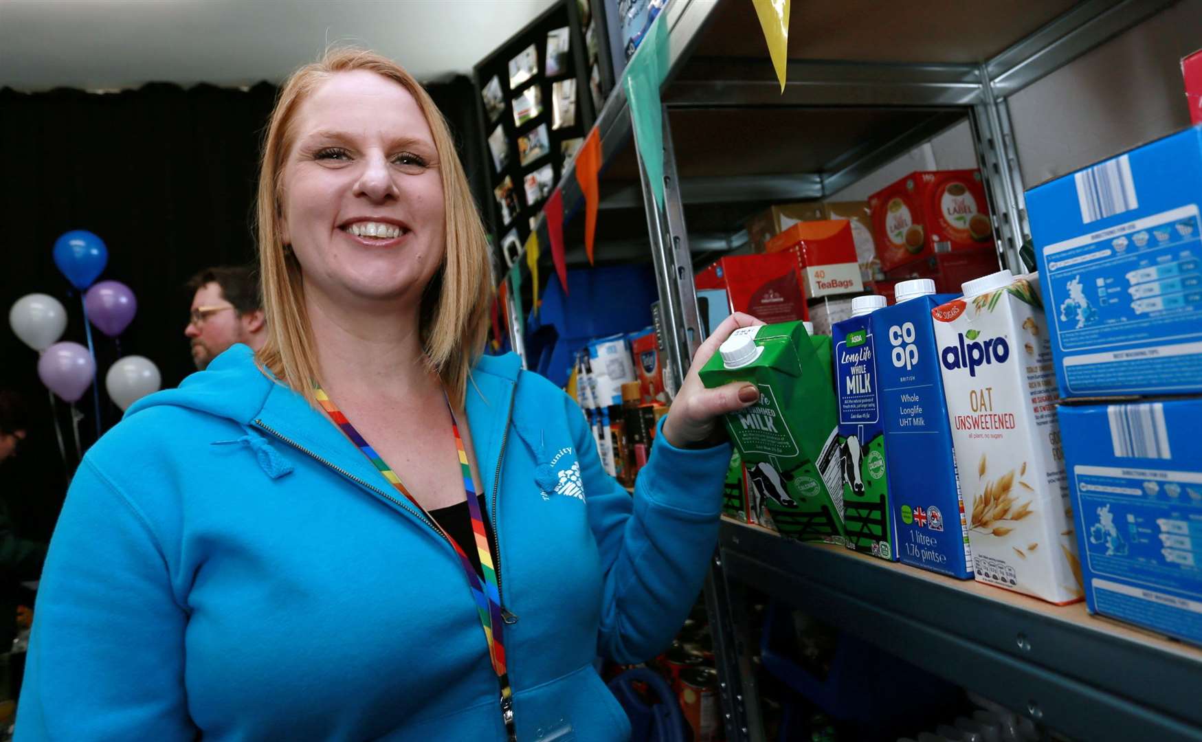 Community Cupboard trustee Tracy Wood is delighted with the re-stocked shelves
