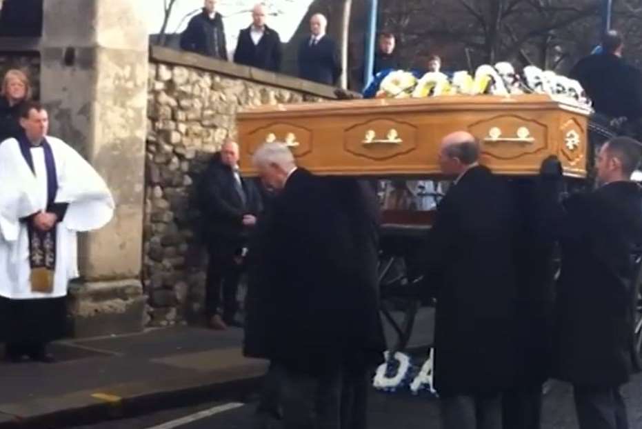 The coffin carrying Ryan "Felix" Glenny is taken into the church