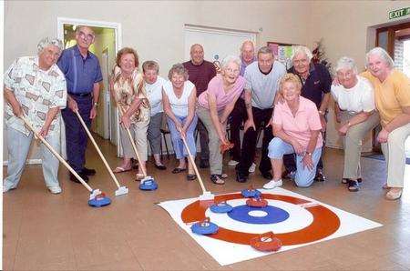 Members of Kemara enjoying a game of new age kurling. Far right is Ivy Ridley who is encouraging people to take part