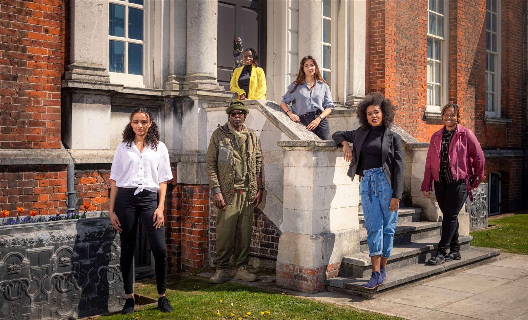 Clifton with the other artists commissioned to create portraits for English Heritage's Painting our Past: The African Diaspora in England Picture: English Heritage