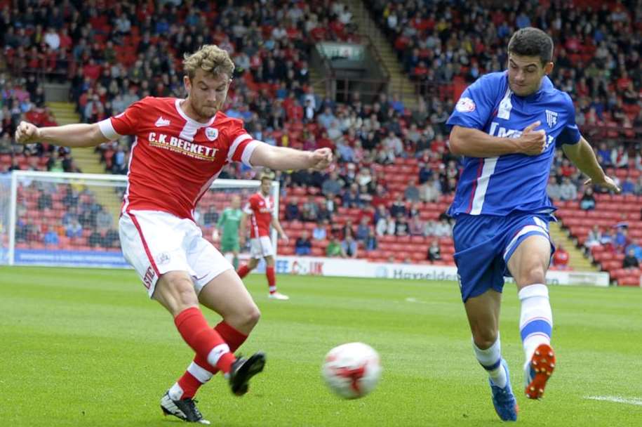 Gillingham defender John Egan in action during the 4-1 defeat at Oakwell this season Picture: Barry Goodwin
