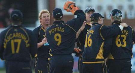 Warne and his team-mates celebrate after Andrew Symonds losing his wicket. Picture: ADY KERRY