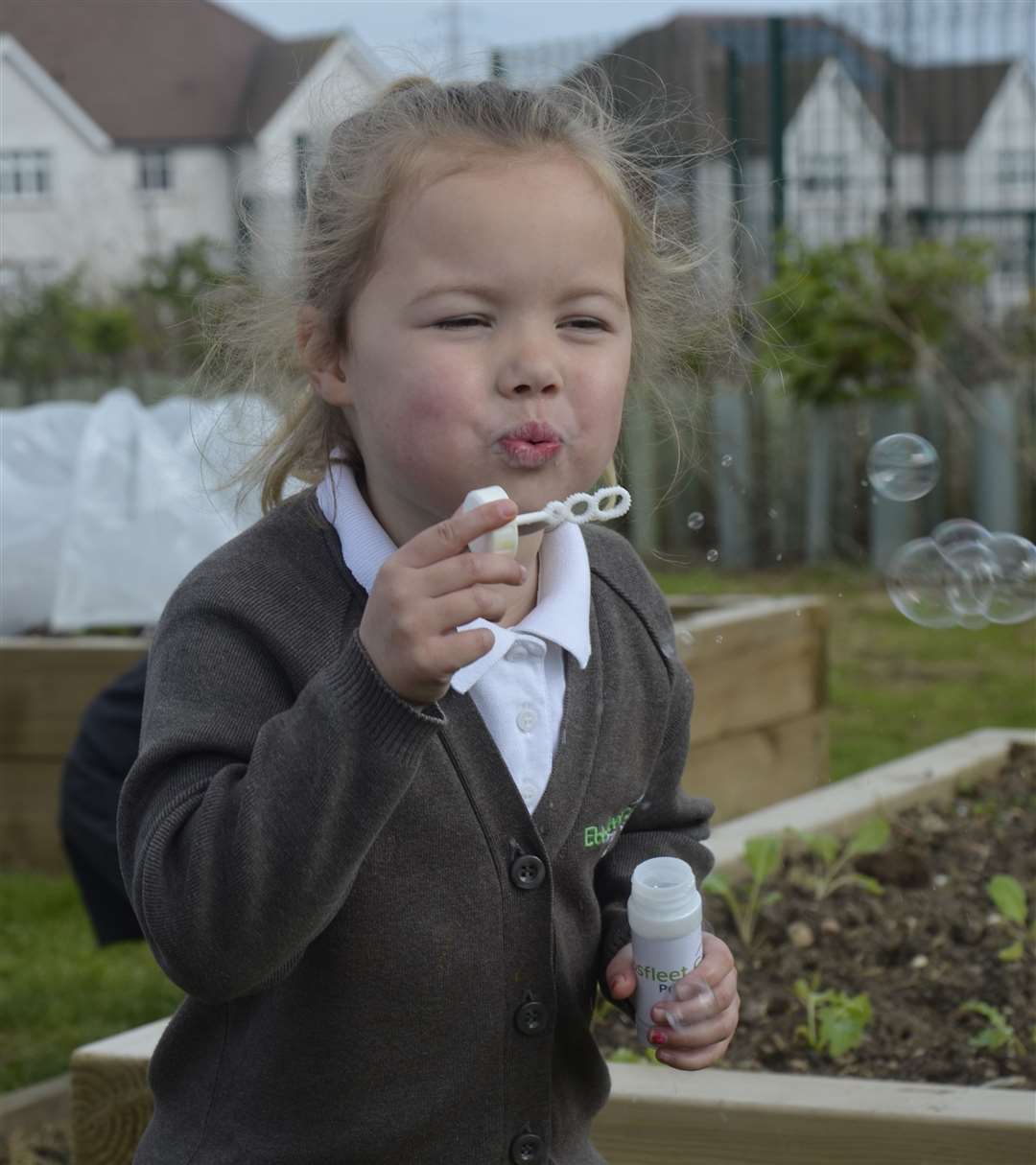 Nursery pupil, Avery, enjoying the bubbles handed out to children at the launch. Photo credit: Poppy Webster