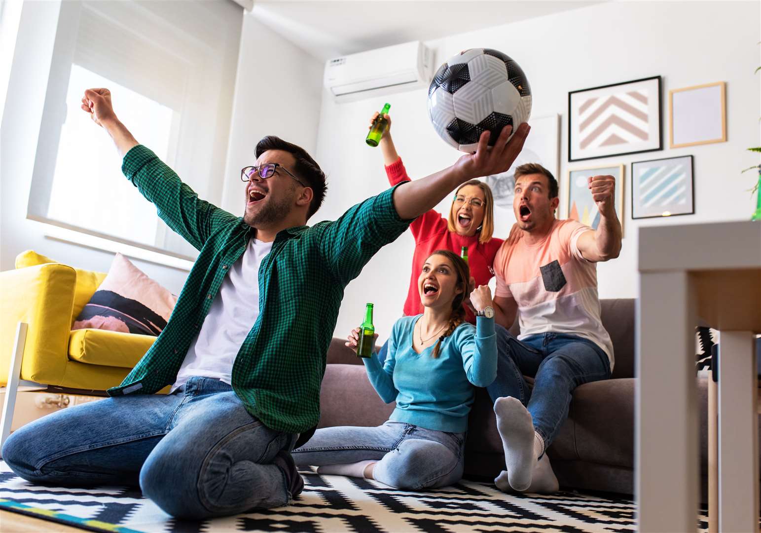 Football fans playing with a football, often inside, led to a rise in insurance claims in 2018. Image: iStock.