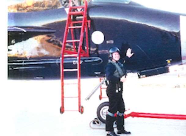 Pilot Simon Wells with a Lightning aircraft at an air display