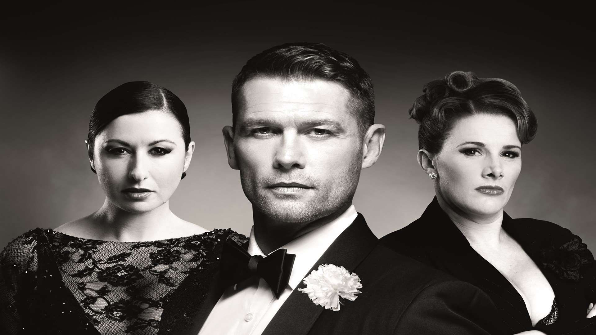 John Partridge as Billy Flynn in Chicago with Hayley Tamaddon as Roxie Hart (left) and Sam Bailey as Mama Morton