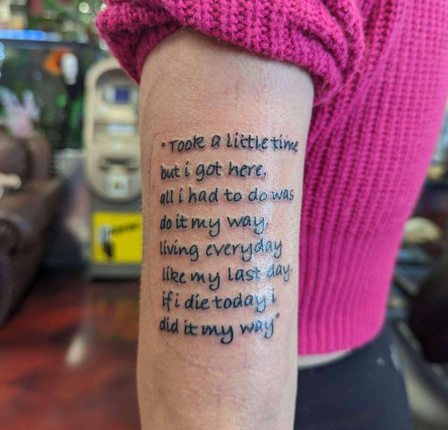 The woman who lives almost 4,000 miles away got the lyrics tattooed on her arm