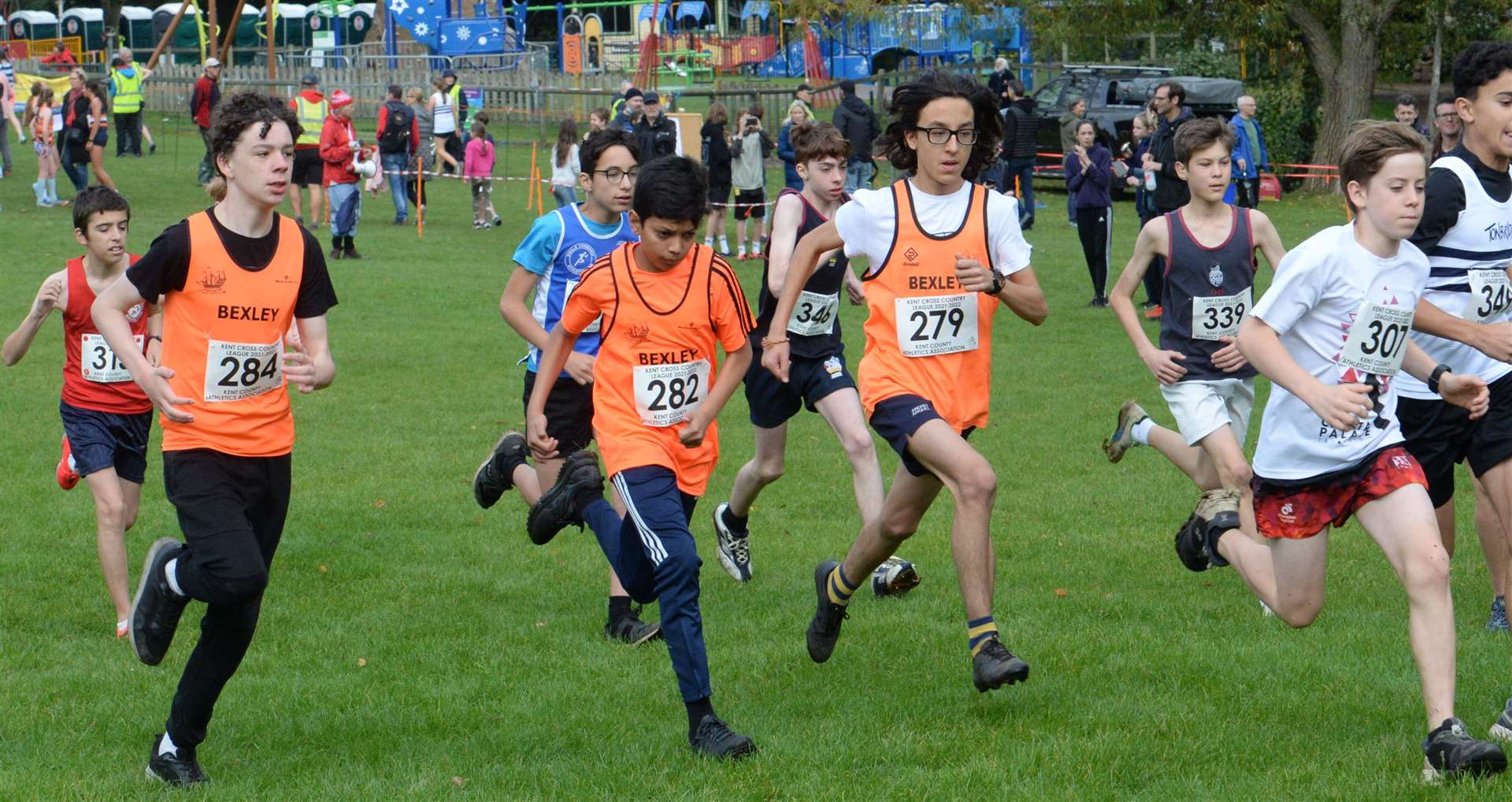 Bexley AC trio No. 284 Fredrick Todd, No. 282 Aryaan Sahota and No. 279 Andrei Anghel in the under-15 boys' race. Picture: Chris Davey (52348032)