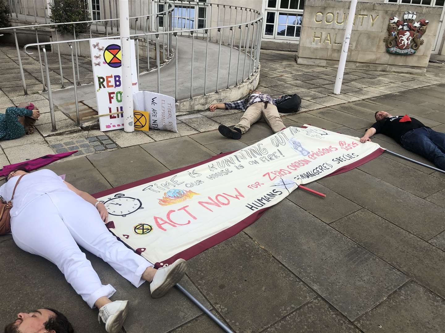 Extinction Rebellion protesters staged a "die-in" outside County Hall in Maidstone