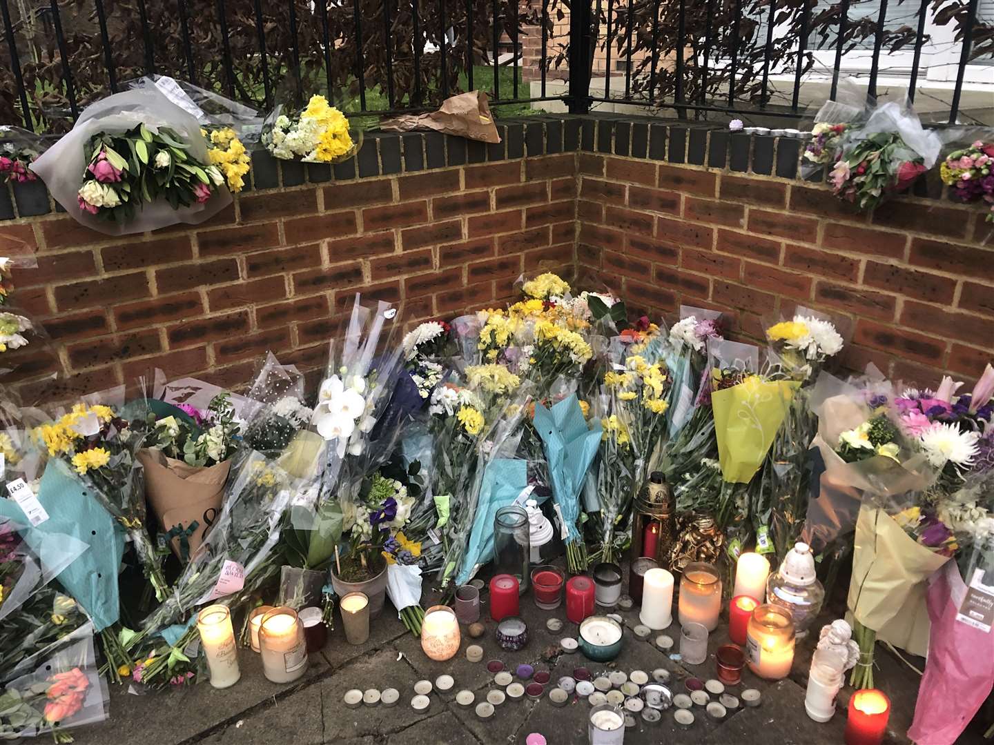 Floral, candle and basketball tributes have been laid for Szymon
