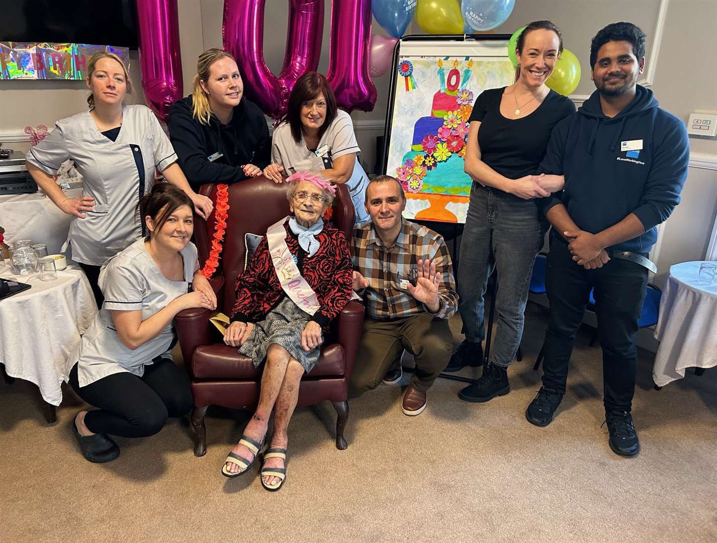 Vera with care home staff during her birthday celebrations