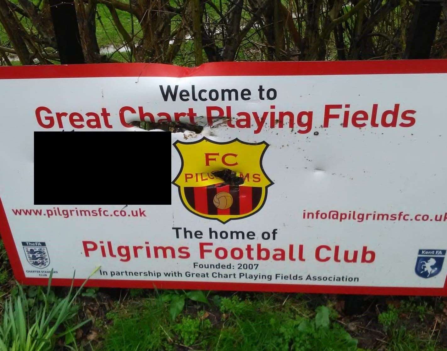 The Pilgrims FC sign was targeted by vandals. The slogan has been censored