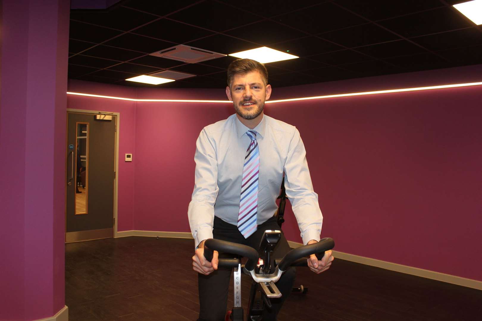 Cllr Matthew Forest tried out a static bike in a dedicated spin class studio