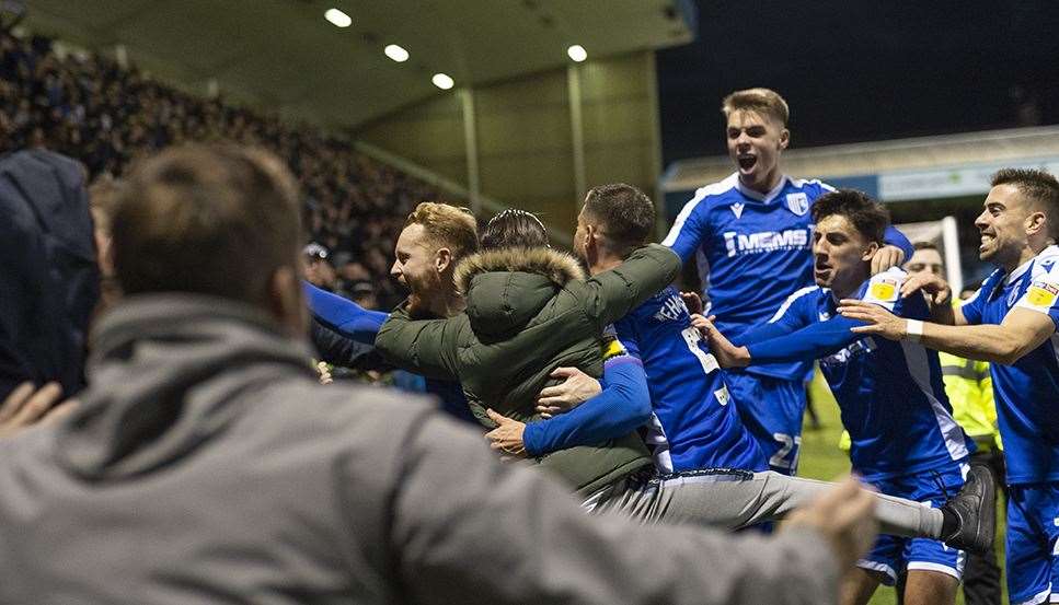 Players celebrate with fans as Connor Ogilvie puts the Gills ahead Picture: Ady Kerry (23648743)