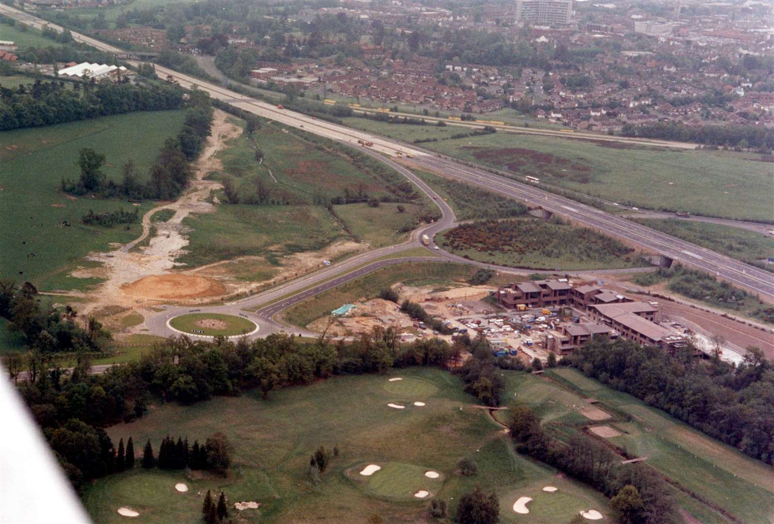 The open expanse on the left of this 1991 photograph later became Eureka Leisure Park, the home of Ashford's Cineworld. Sainsbury's is also yet to be built, as can be seen in the right of the right of the picture. The Eurogate Business Park is under construction in the bottom right. Picture: Steve Salter