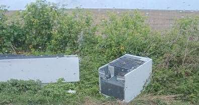 Fridges and a cooker that have been dumped on the side of Stickfast Lane, near Bobbing. Picture: Donna Shaw