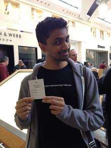 One very happer iCamper with his lucky ticket, which means he's guaranteed an iPhone 5.
