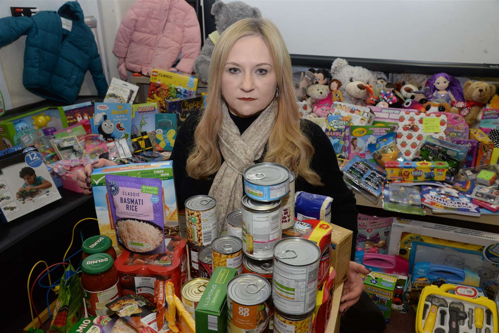 Steph Hammond with donations given to Luton Infant School food bank in December. Picture: Chris Davey