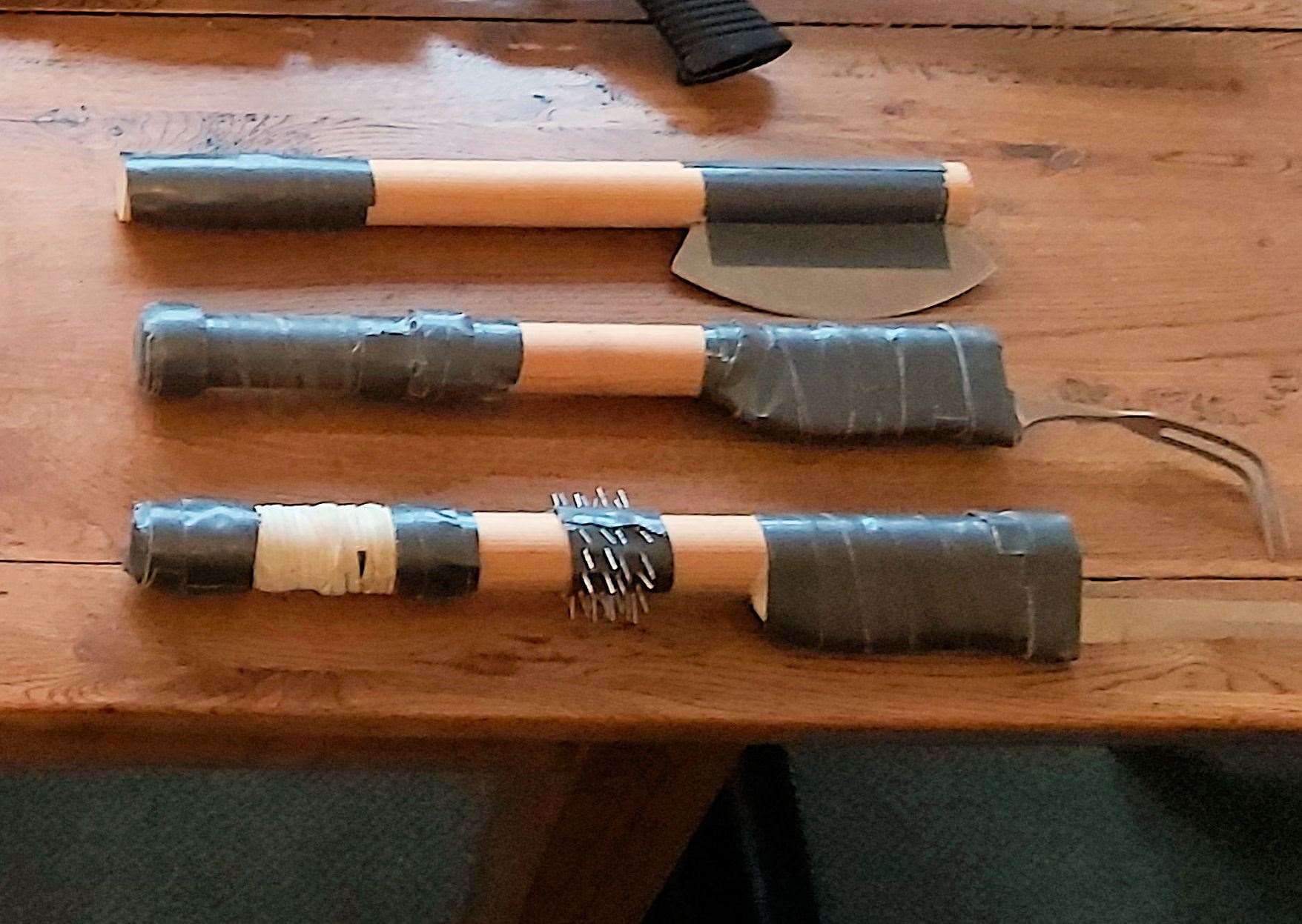 The weapons found during the drugs raid Picture: Kent Police