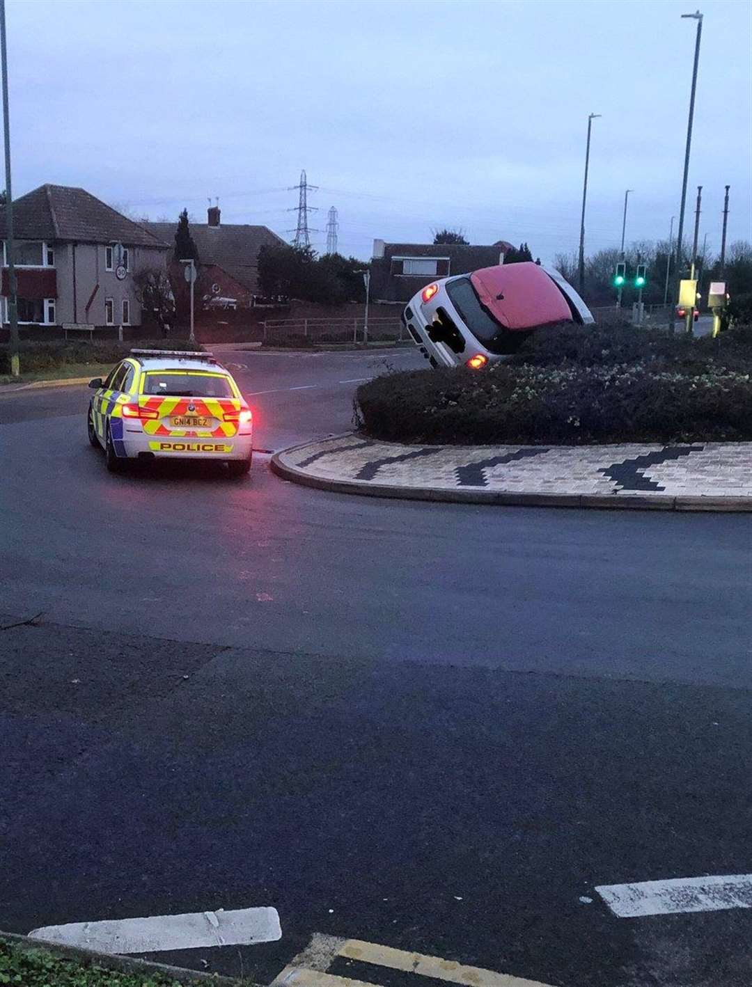 A stolen car ended up on top of a roundabout on Christmas Day. Picture: @kentpoliceroads (6224633)