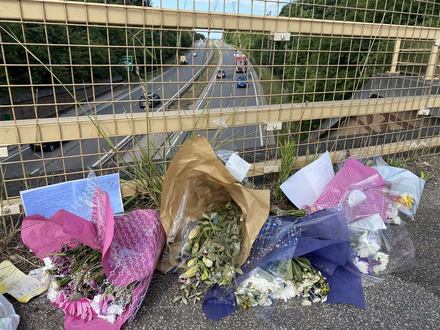 Floral tributes left for Preston Turner after he jumped from a bridge over the A249 into incoming traffic