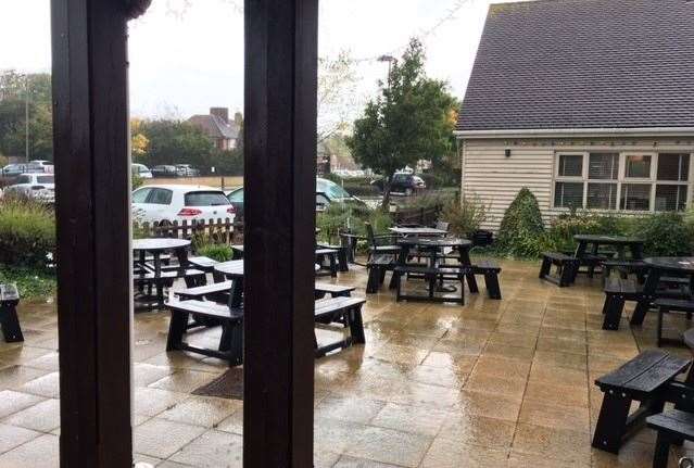 The main area at the front of the pub is paved over with plenty of space for stacks of picnic tables and benches