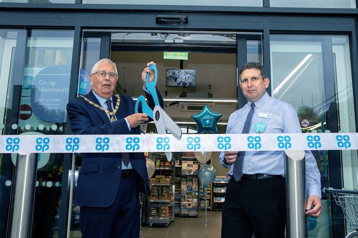 Dover District Council's chairman Cllr Mike Conolly officially opened the Crabble Hill Co-op with store manager Ian Armstrong. Picture Matt Bristow