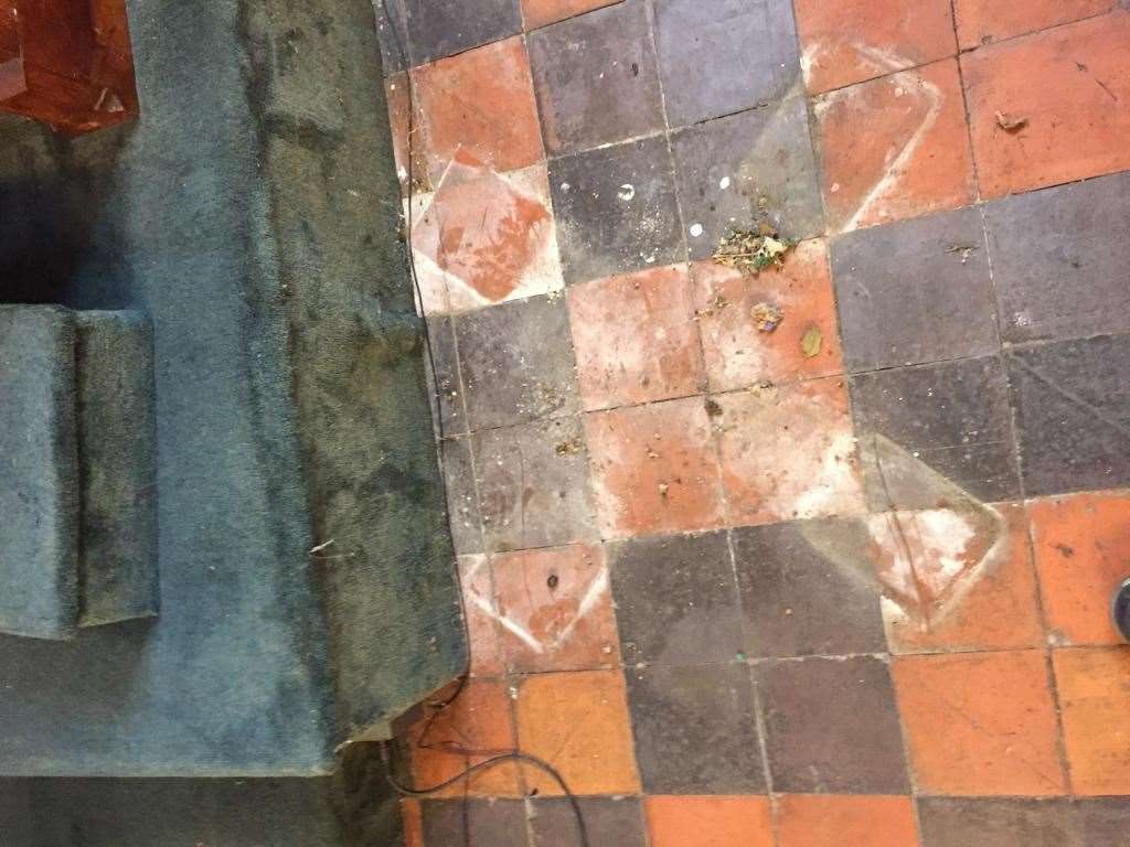 Marks on the floor of the church where the lectern has been removed. Picture: Robert Wiseman