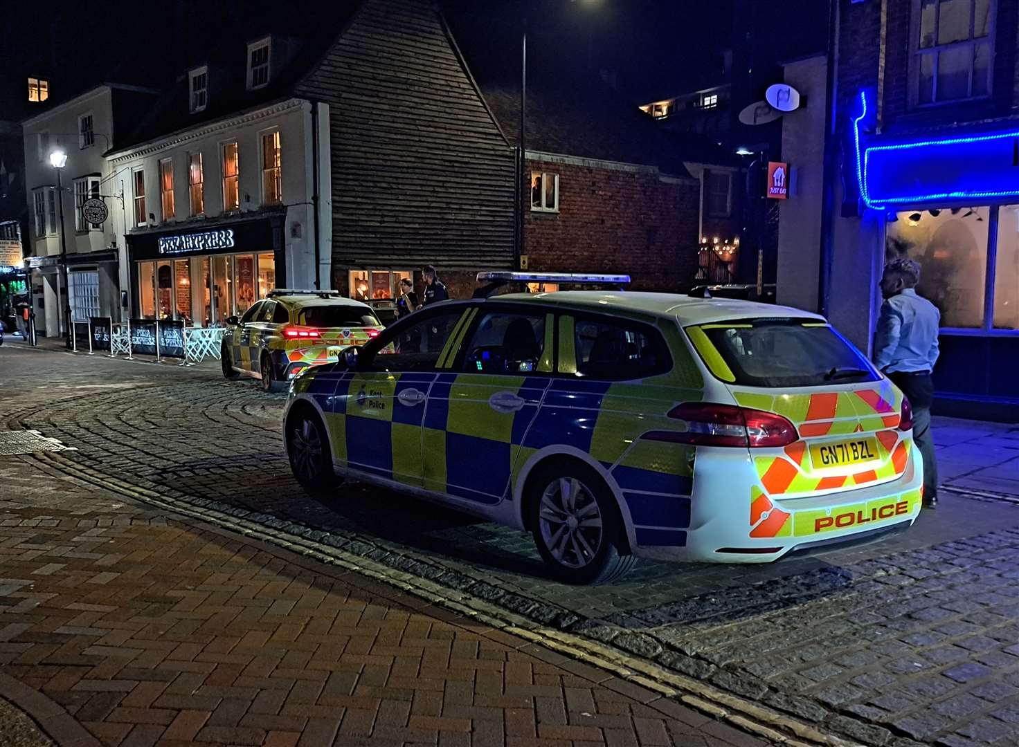Police in Ashford's North Street yesterday evening