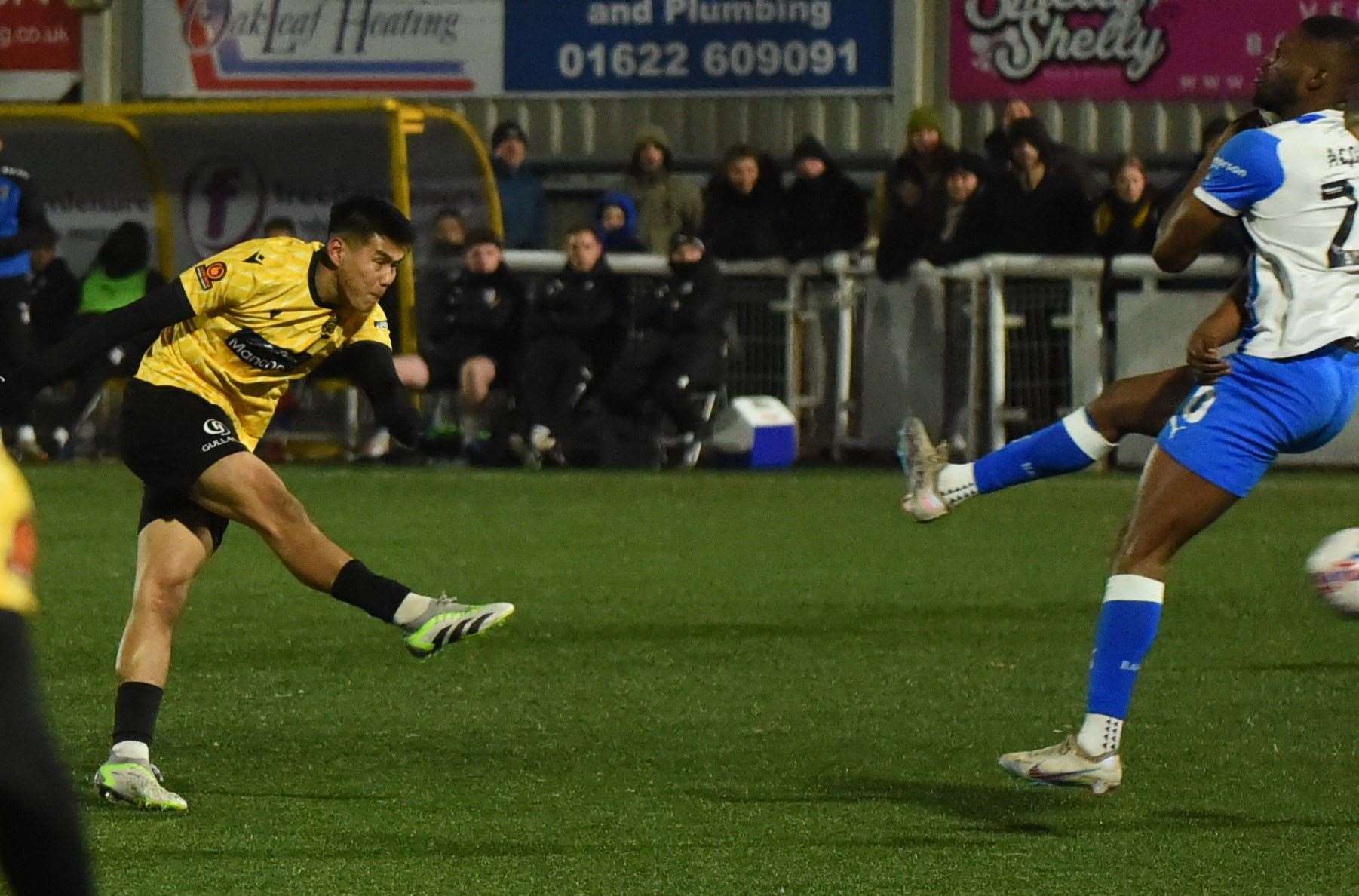 Maidstone midfielder Bivesh Gurung scores the winner against Barrow in the FA Cup. Picture: Steve Terrell