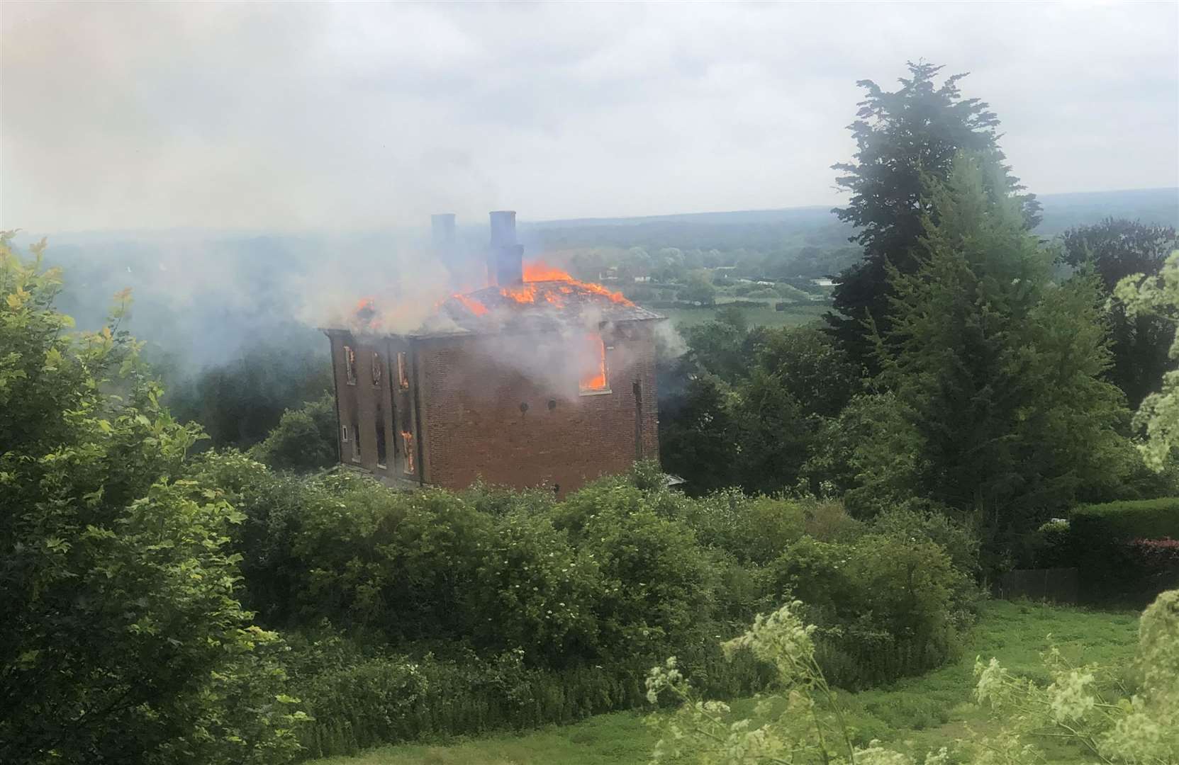 The house on fire in Sutton Valence. Picture Carole Sinclair-Smith