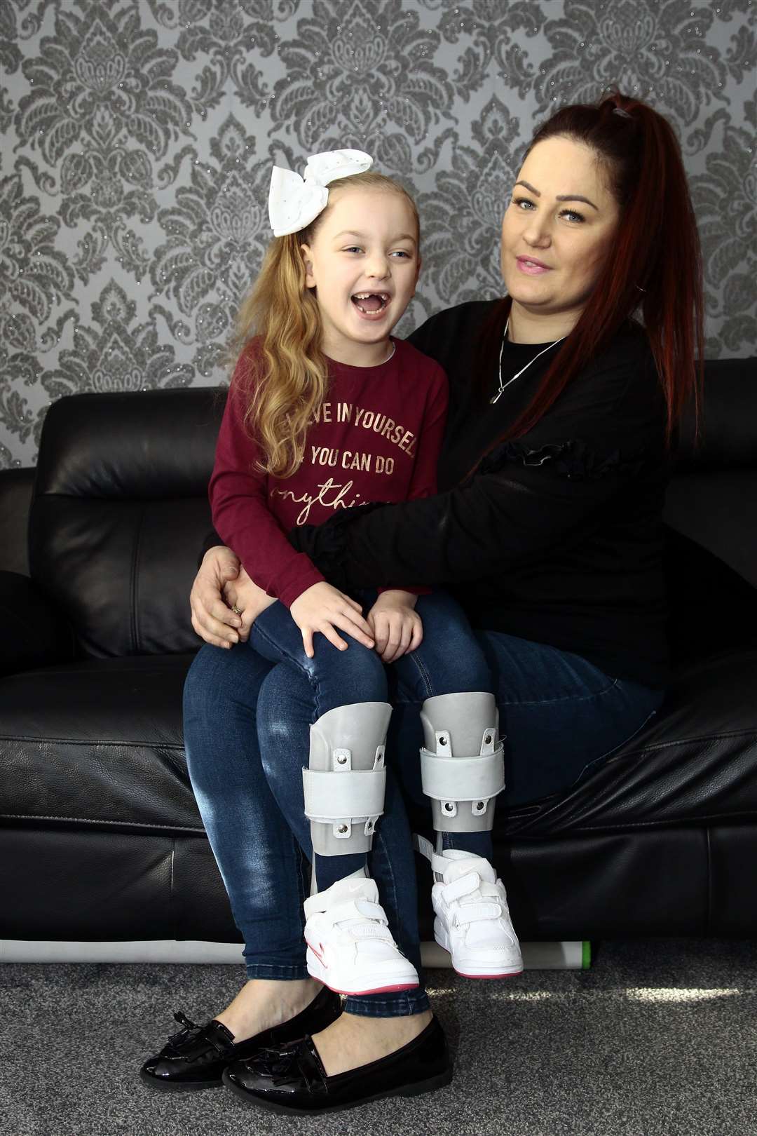 Lily-Mae Leadsham 6, pictured with her mum Kerry at their home in Ringlestone, Maidstone. Picture: Sean Aidan