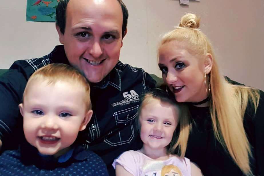 Jason Ryder and his partner Jade Knight with their children, Bella, four, and Peter, three