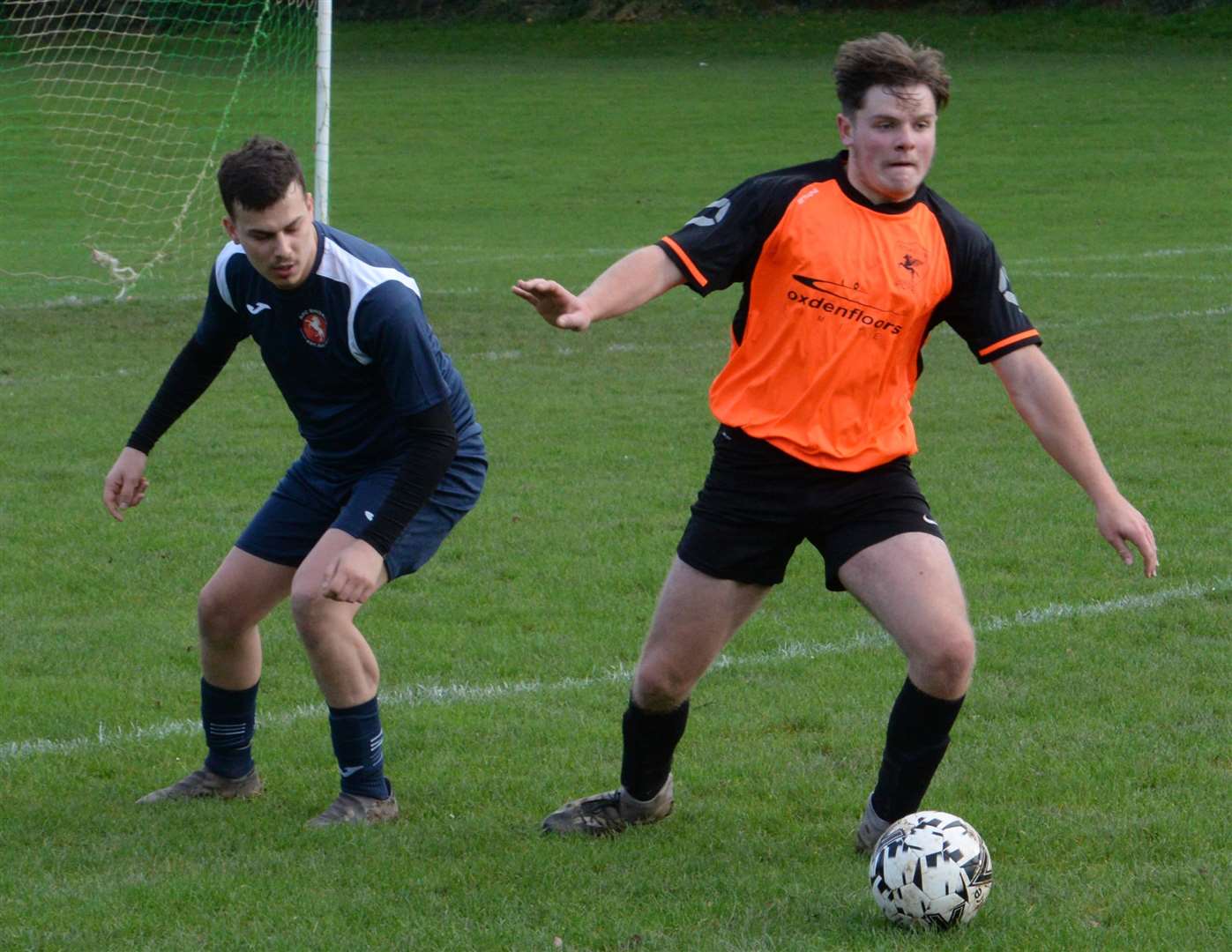 Pegasus 81's Ethan Parsons on the ball, checked by AFC Shorne's Mack Sutton. Picture: Chris Davey (53210770)