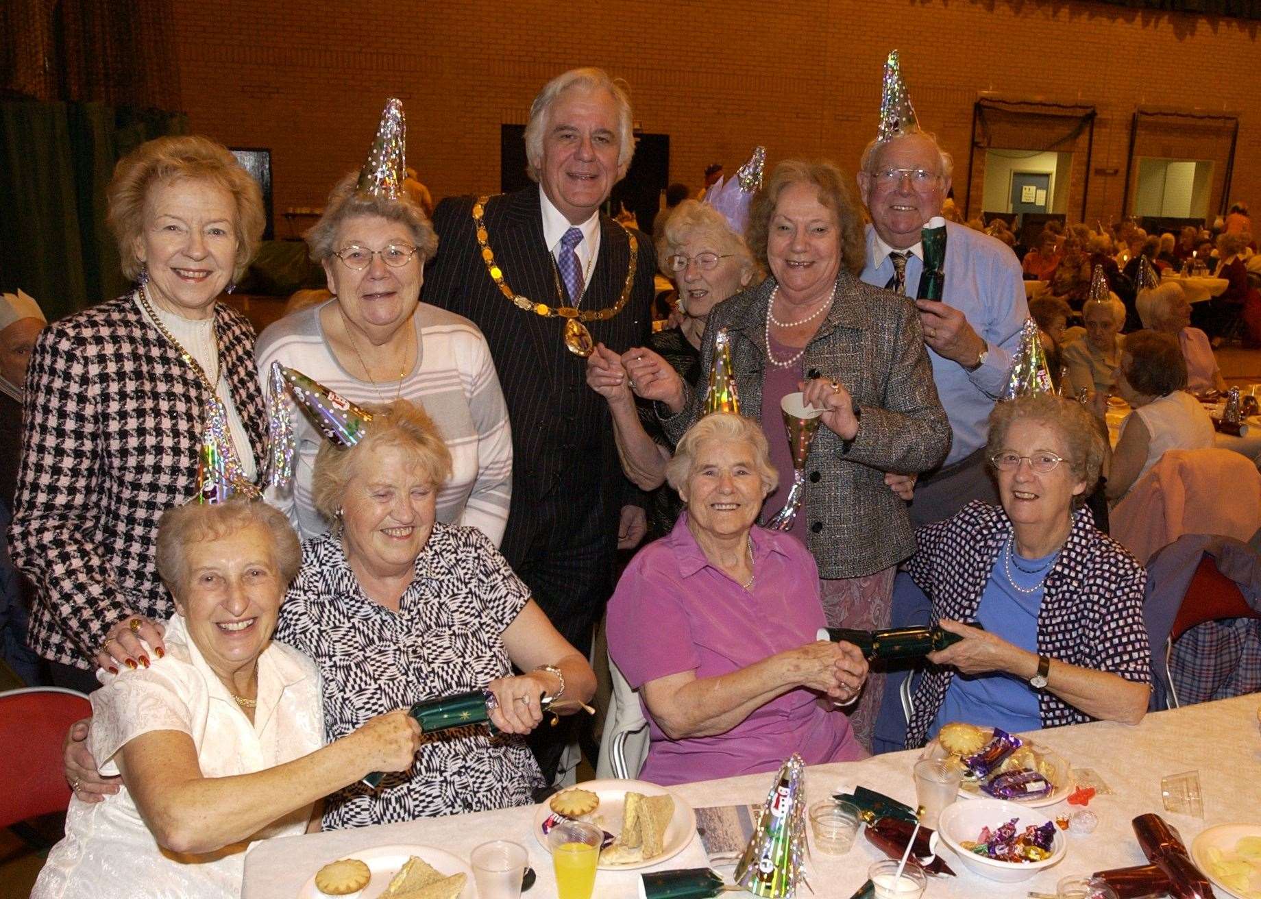 The then Mayor and Mayoress, Peter and Evelyn Homewood, join a senior citizens Christmas party at the Angel Centre in 2004