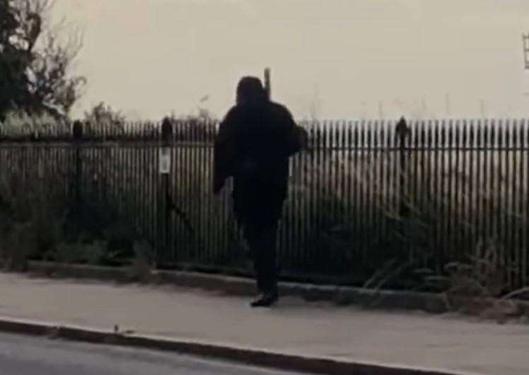 The balaclava-clad man was spotted swinging a bat in Margate. Picture: Layla Symons