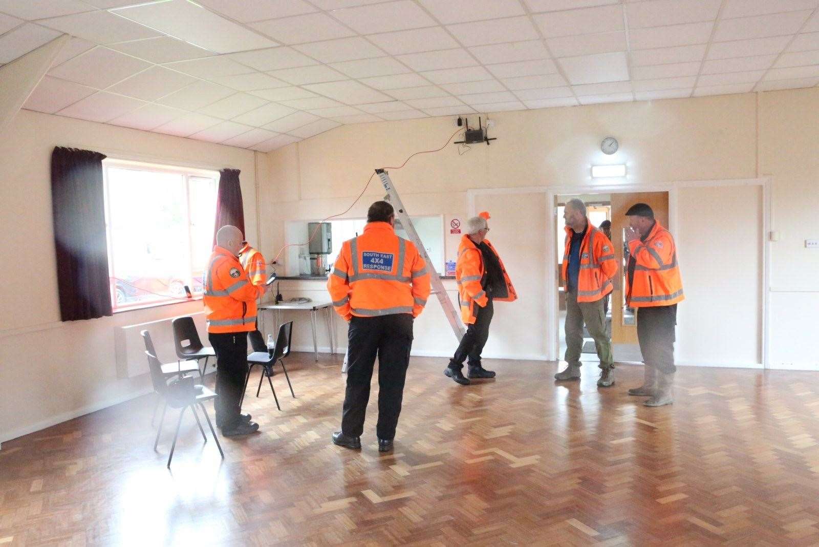 Volunteers from South East 4x4 Response at a control centre set up in Yalding village hall. Picture: UKNIP