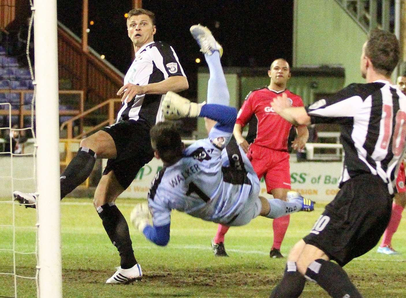 Dover goalkeeper Mitch Walker in the thick of the action at Bath City on Tuesday Picture: Simon Howe/Bath City FC